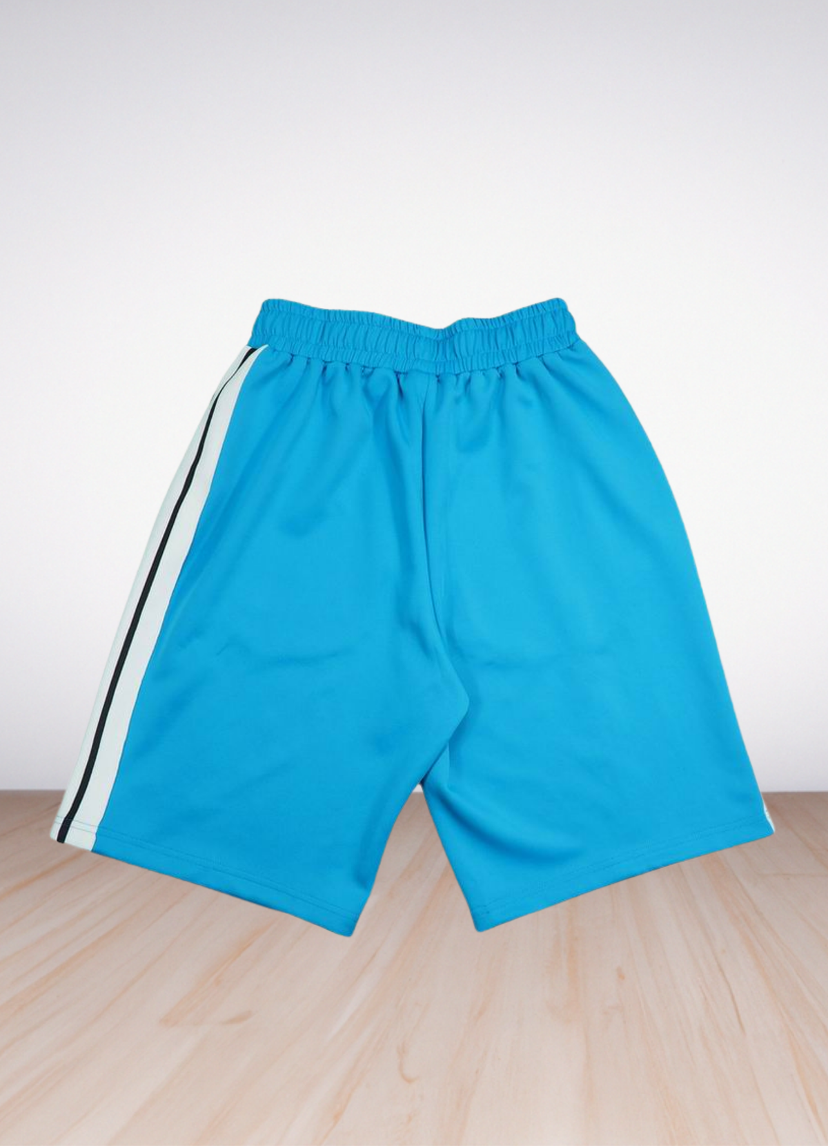 מכנסי שורטס Palm Angels בצבע כחול טורקיז עם הדפס לוגו