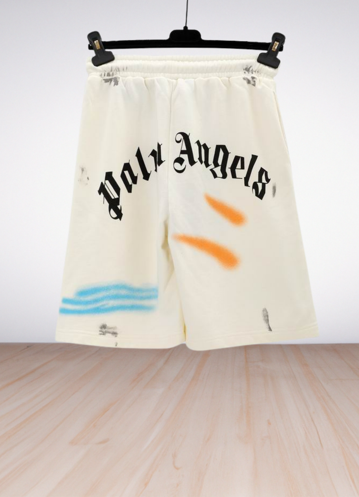 מכנסי שורטס Palm Angels בצבע שמנת עם הדפס לוגו צבעוני