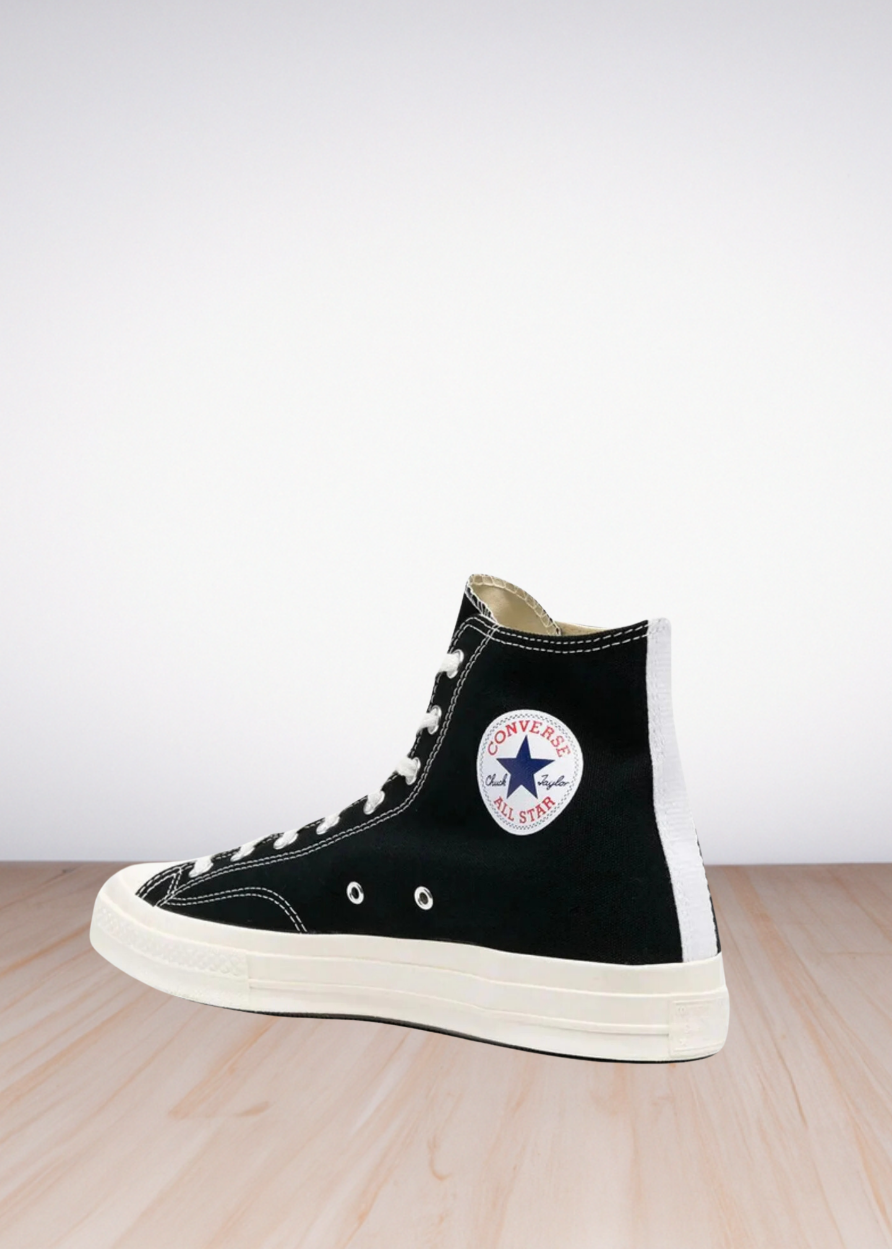 Comme Des Garçons x Converse high-top trainers