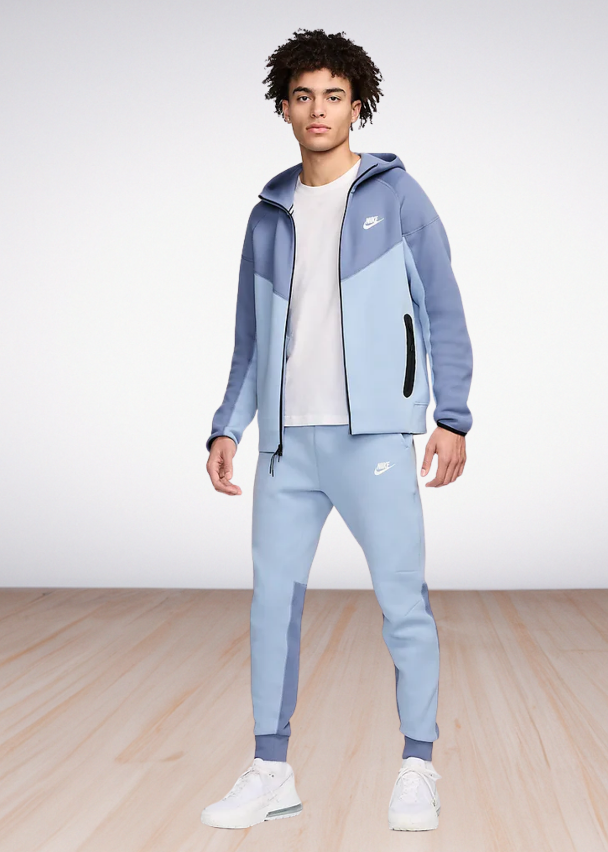 חליפת טרנינג Nike Tech בצבע כחול עמוק – סט סווטשירט ומכנס