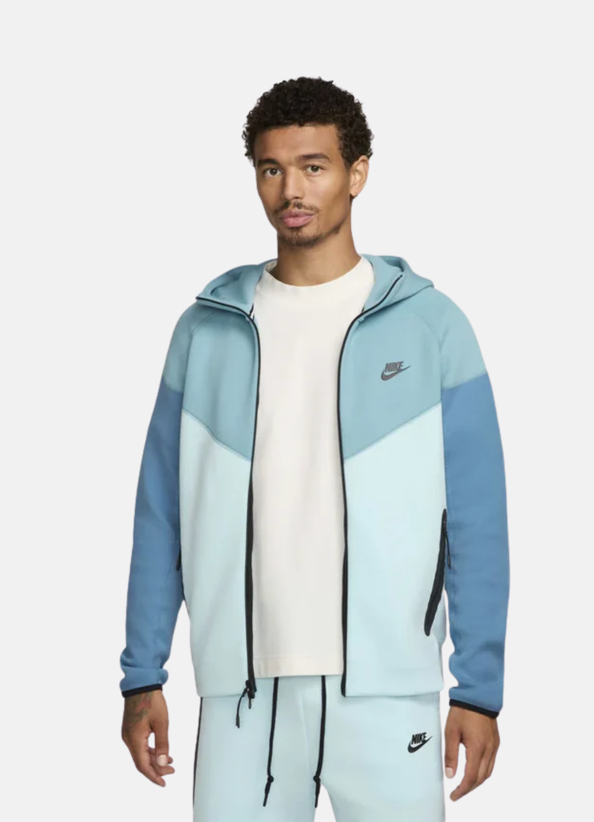 חליפת טרנינג Nike Tech בצבע טורקיז וכחול קרח – סט סווטשירט ומכנס