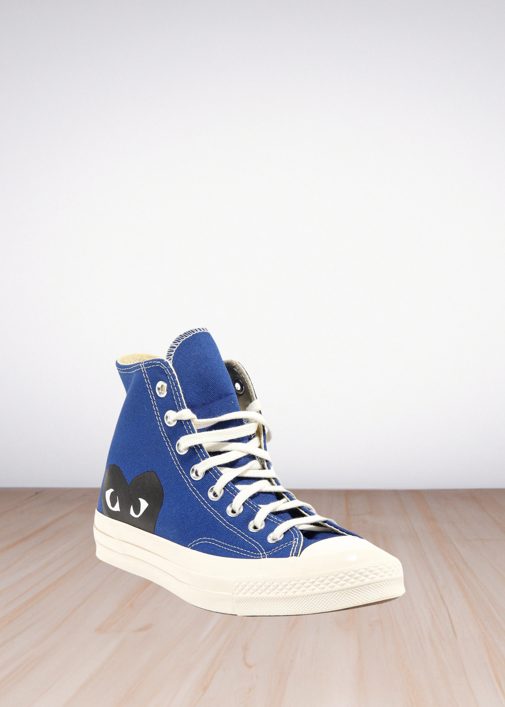 Comme Des Garçons x Converse high-top trainers