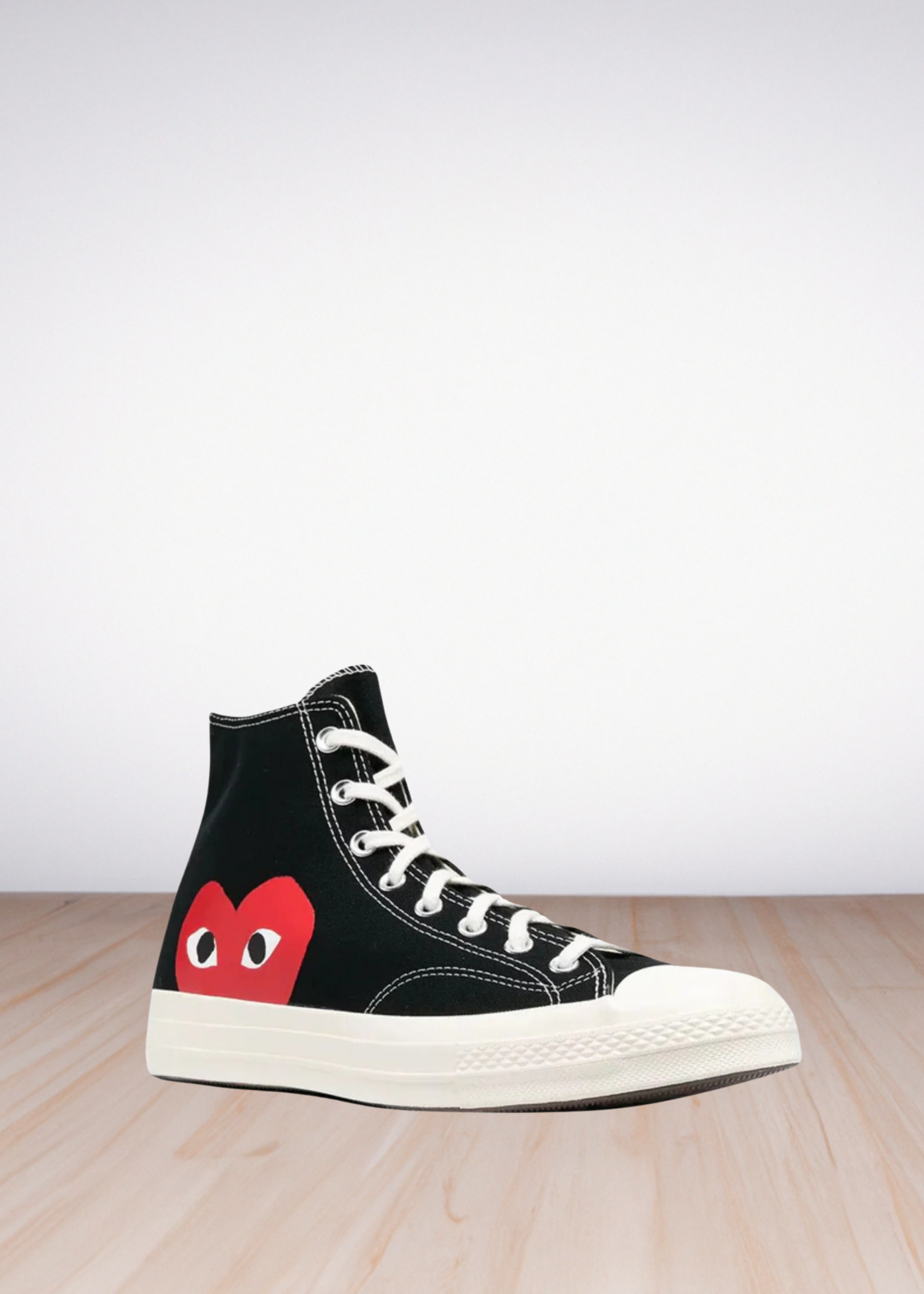 Comme Des Garçons x Converse high-top trainers